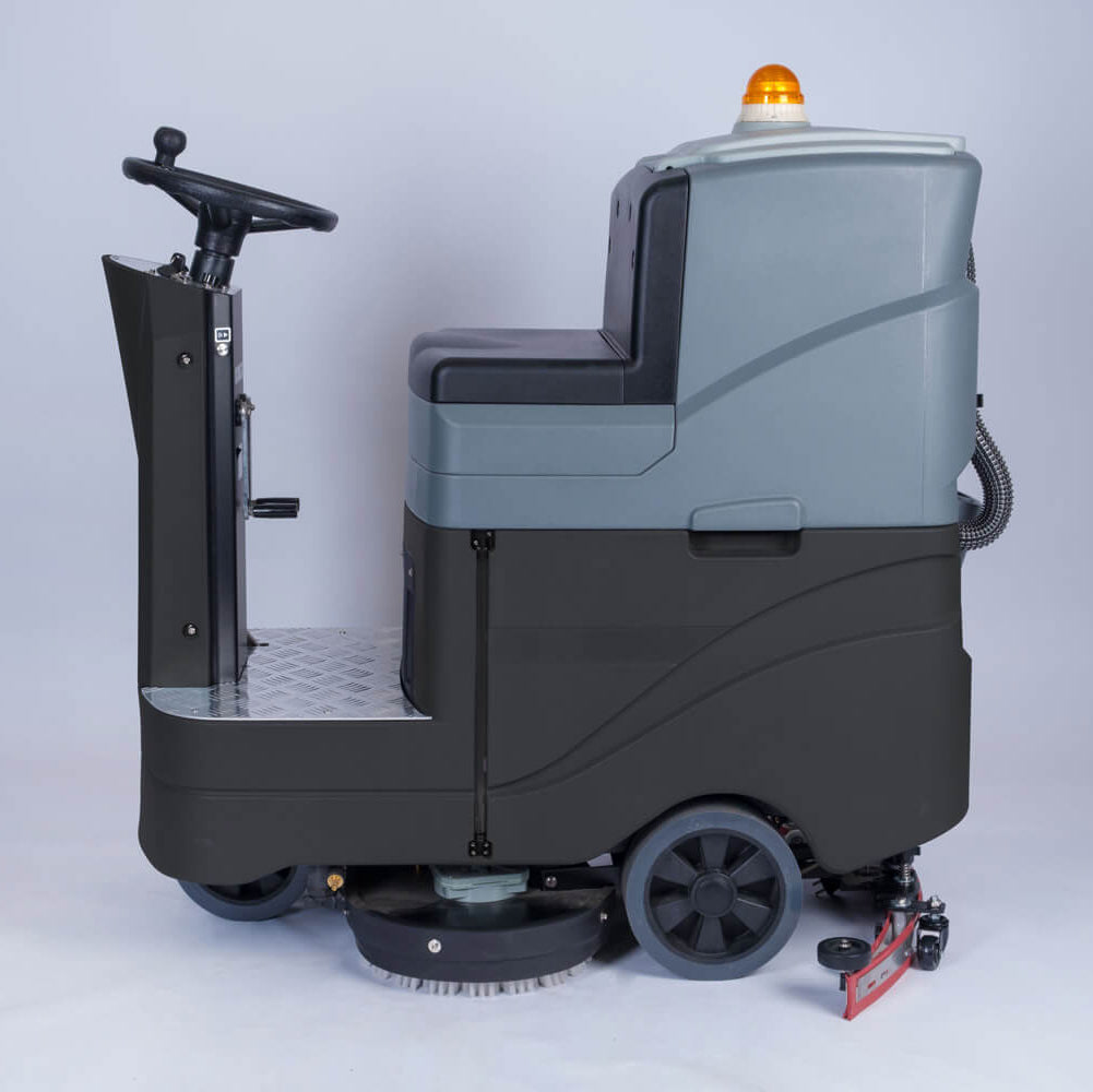 Left side view of black and grey ride-on scrubber dryer by brand Blancus, model D8.
