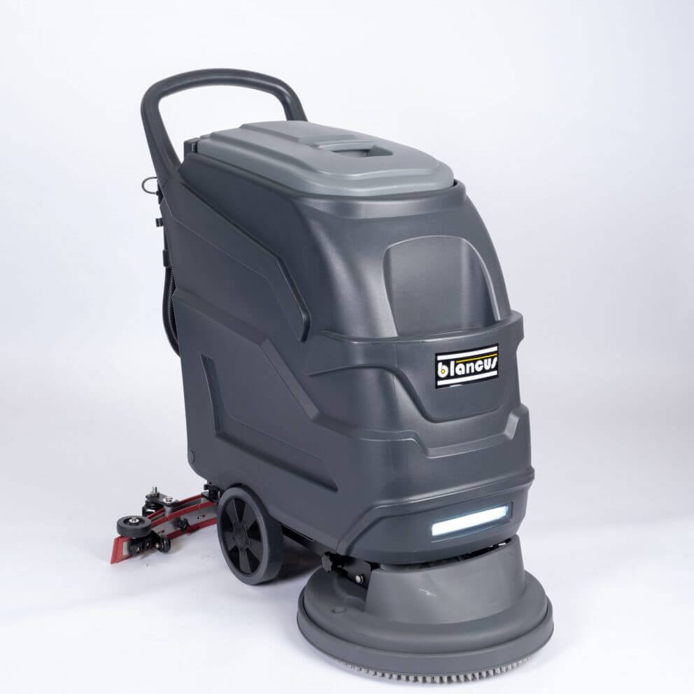 Front side view of grey scrubber dryer walk behind by brand Blancus, model SC4500E.