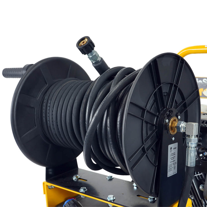 Front side view of yellow and black pressure washer with hose reel by brand SkyVac, model SlipStream Pro 21X, engine brand Honda.