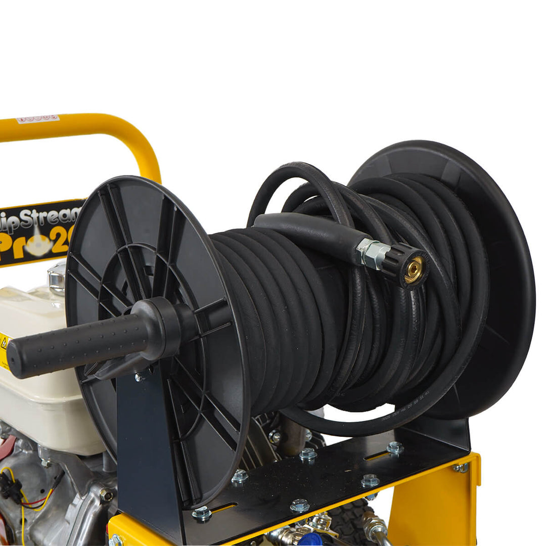 Close up of hose reel belonging to yellow and black pressure washer by brand Skyvac, model SlimStream Pro 20, and engine Honda.
