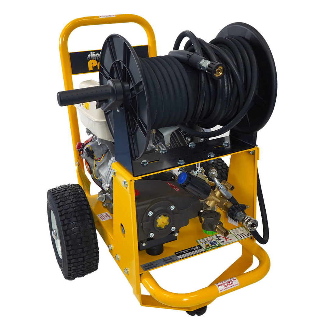 Front view of yellow and black pressure washer with hose by brand SkyVacm model SlipStream, and engine Honda.