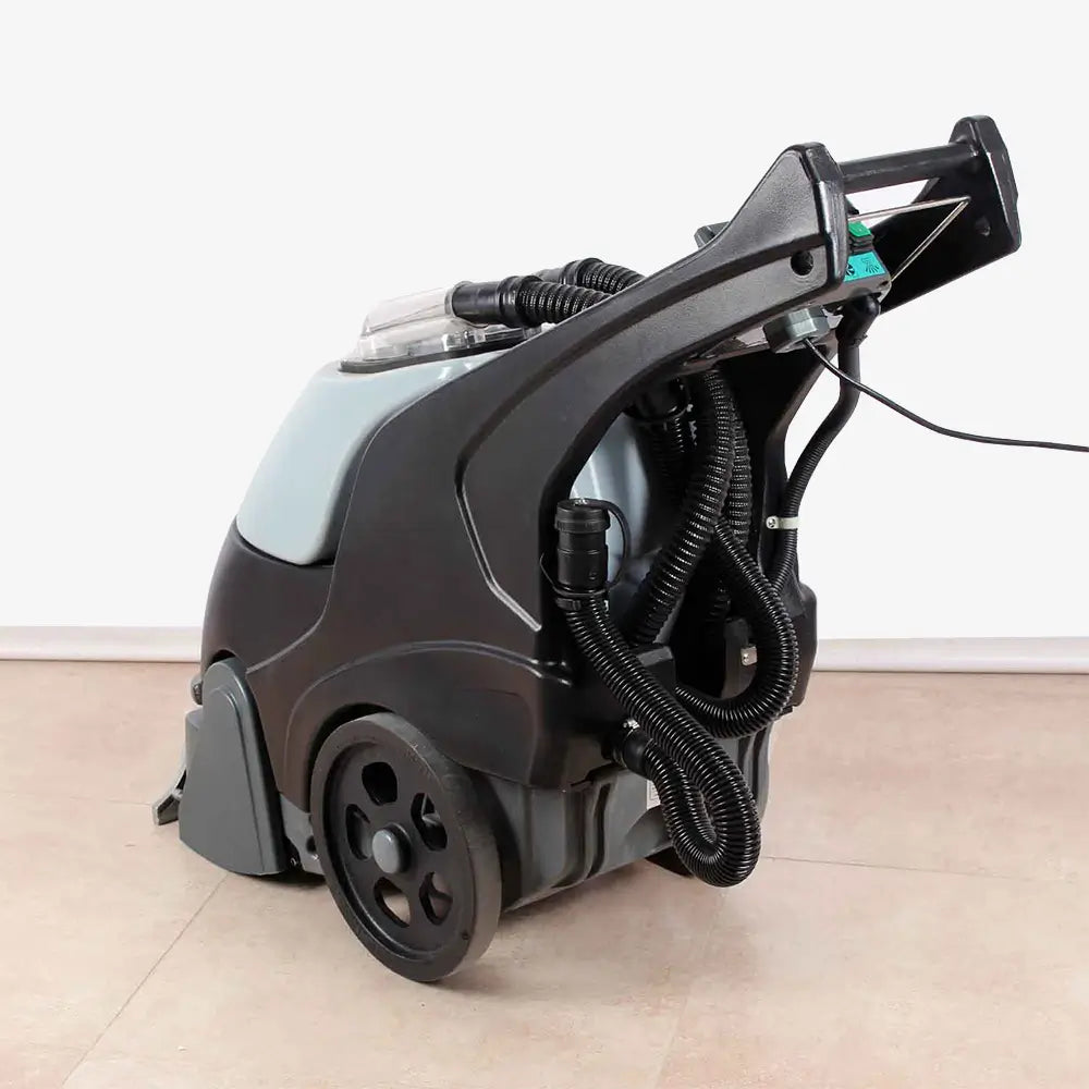 Back side view of grey carpet cleaner machine by brand Star, model Combi Compact.