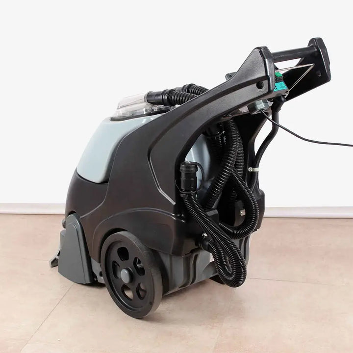 Back side view of grey carpet cleaner machine by brand Star, model Combi Compact.