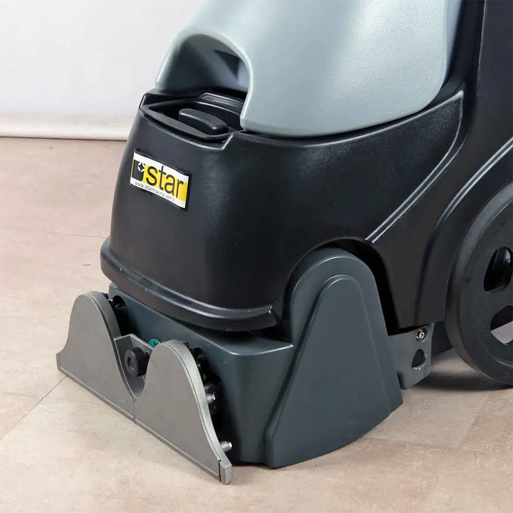 Close up view of sweeper to grey carpet cleaner machine by brand Star, model Combi Compact.
