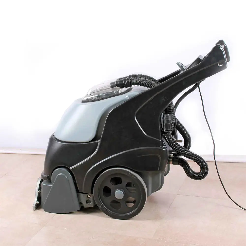 Left side of grey and black carpet cleaner machine by brand Star, model Combi Compact.