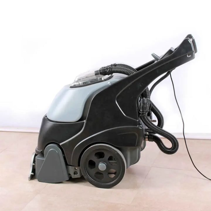 Left side of grey and black carpet cleaner machine by brand Star, model Combi Compact.
