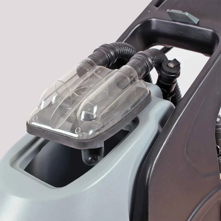 Plastic dust collector to grey carpet cleaner machine by brand Star, model Combi Compact.