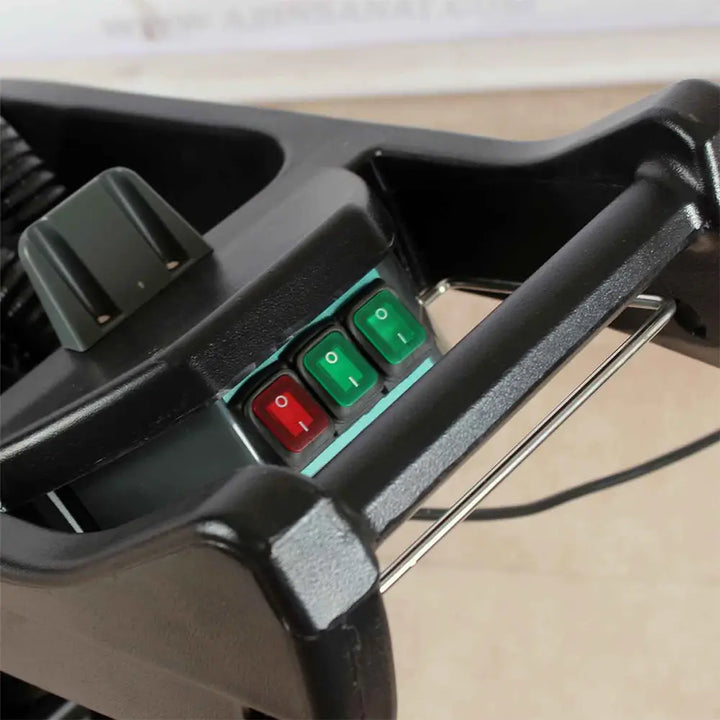 Switches and handle to grey carpet cleaner machine by brand Star, model Combi Compact.
