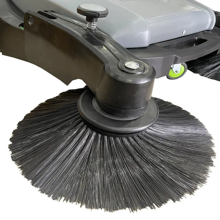 Close up view of bristles to grey and black floor sweeper by brand Star, model 92-40.